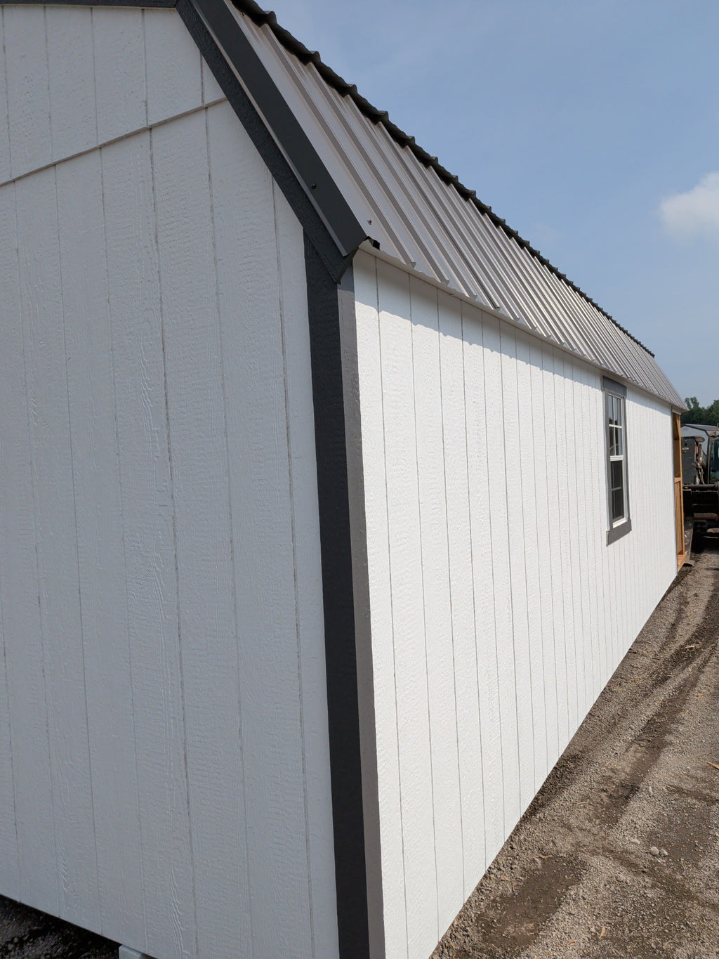 12x28 Lofted Barn Deluxe Playhouse in stock at Old Hickory Buildings of Erin (back)