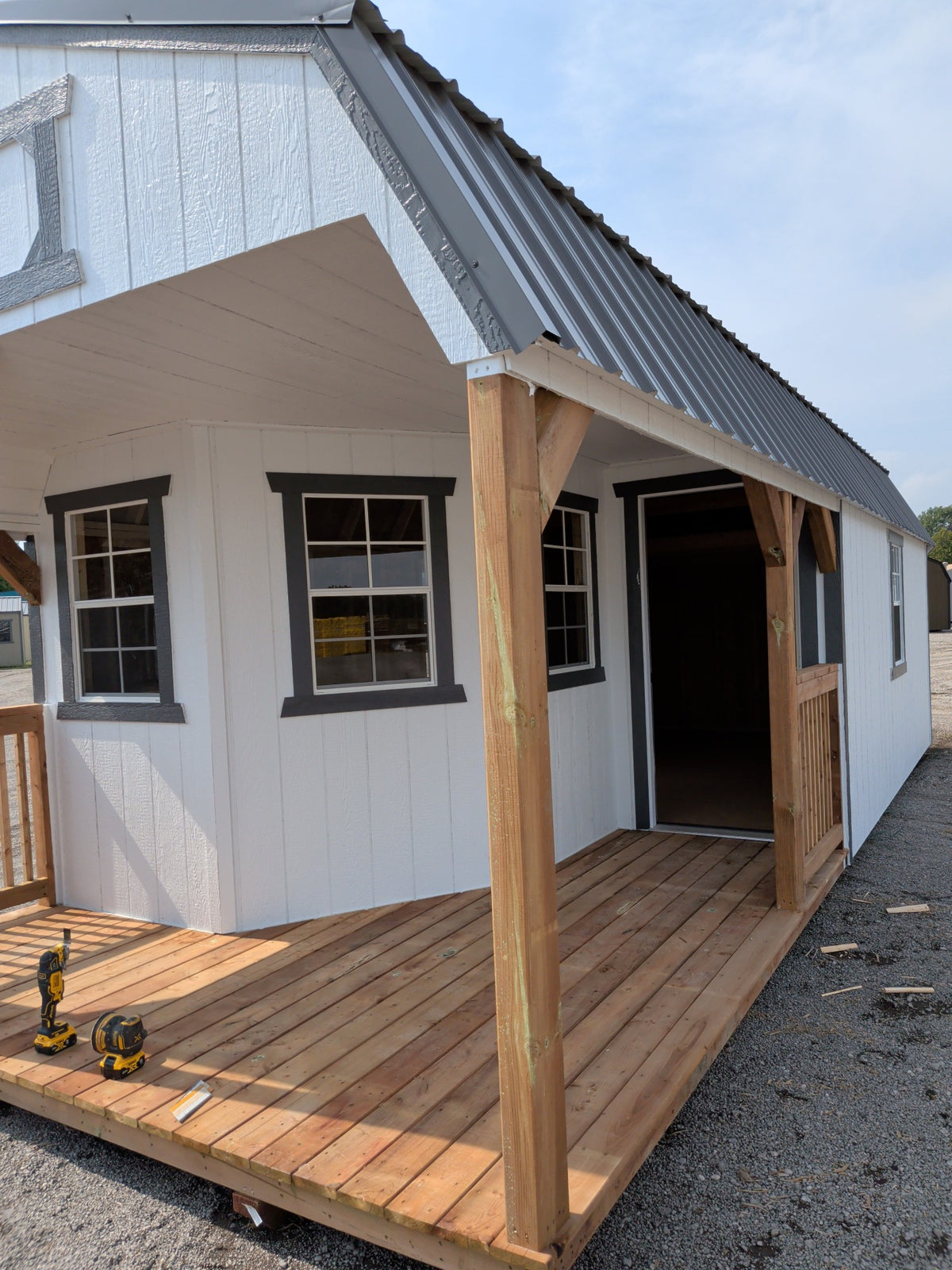 12x28 Lofted Barn Deluxe Playhouse in stock at Old Hickory Buildings of Erin (front)
